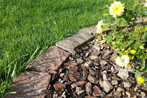 Porphyry kerbs for flowerbeds